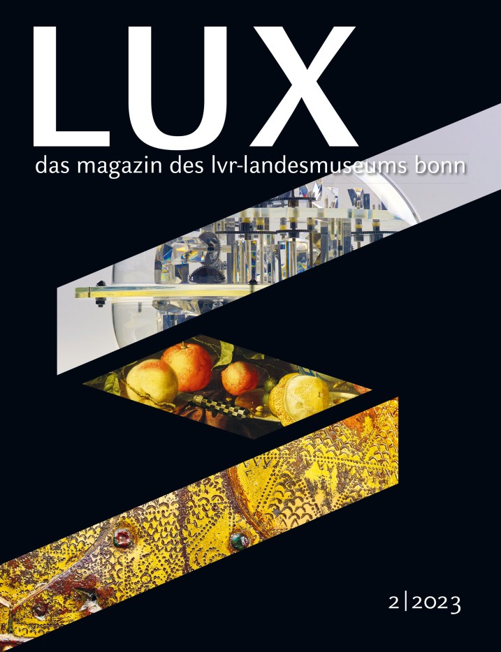 Cover der zweiten Ausgabe von LUX. das magazin des lvr-landesmuseum bonn. Es zeigt einen goldenen Ring auf schwarzem Grund.