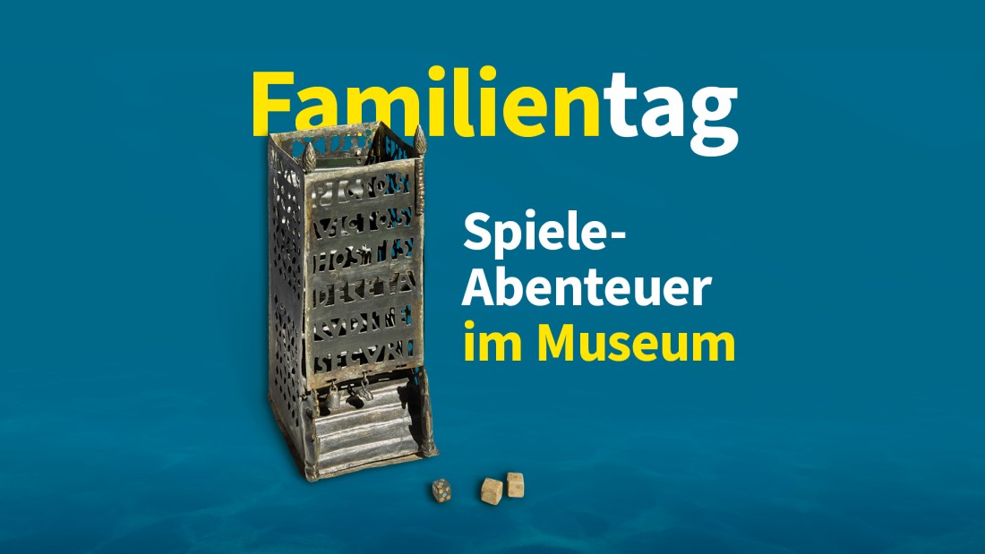 Der Würfelturm kündigt das Spiele-Abenteuer im Museum am Familientag an.